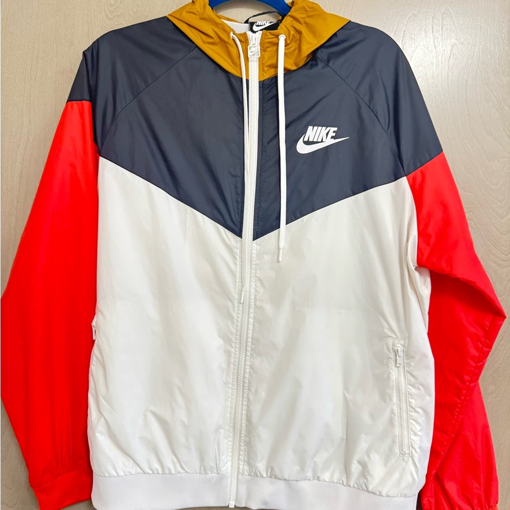Nike woman's coral, White, Black and gold Windbreaker